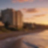Scenic view of Alki Beach waterfront apartments with sunset