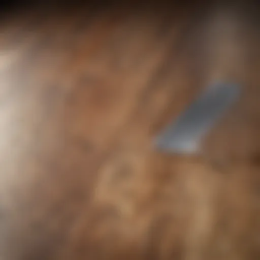 Close-up of laminate flooring with visible film residue