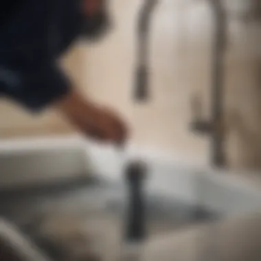 A person using a plunger effectively on a sink drain