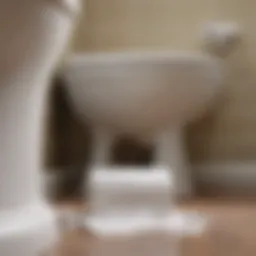 Close-up of a clogged toilet with paper towels