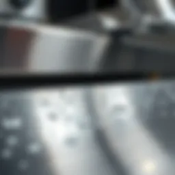 Close-up of stainless steel surface with water spots