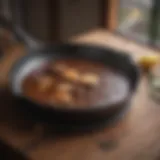 A pristine cast iron skillet on a wooden table