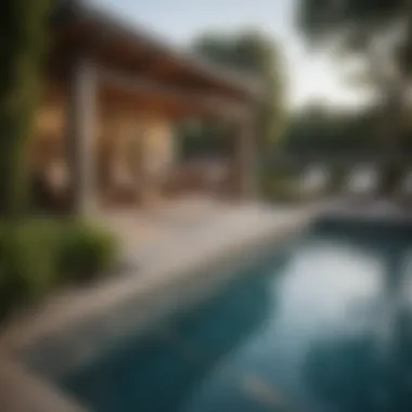 Inviting Poolside Amenities at Vineyard House Amenities area featuring a sparkling swimming pool surrounded by greenery